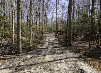 Excavator doing grading and dirt work on a property in Upstate South Carolina